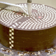 Illustration for article titled Huge chocolate mill reveals delicious changing geometry as you shave it
